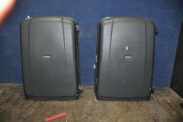 A PAIR OF SAMSONITE HARD SHELL SUITCASES width 52cm x depth 32cm x height 72cm with combination