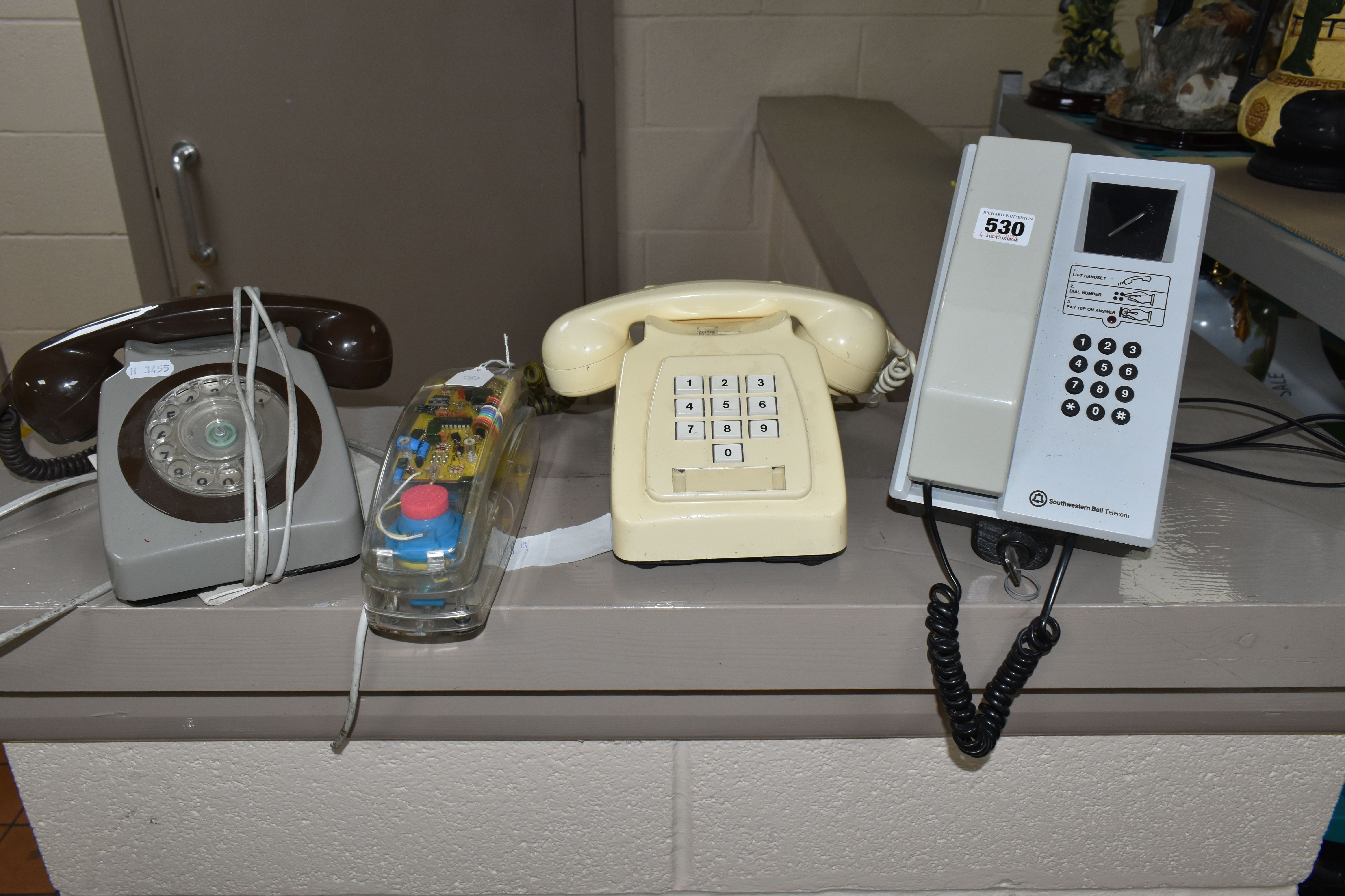 A QUANTITY OF ASSORTED TELEPHONES, to include Southwestern Bell Pay Telephone, No.PP2110, with