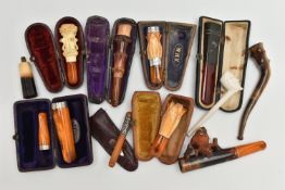 A BAG OF VARIOUS CHEROOTS, to include a cased two piece set mounted with silver collars, four