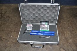A CASE CONTAINING TWO BLUE POINT DHW1 RATCHETS, another ratchet and two packs of TX50 bits
