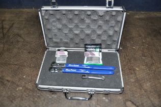 A CASE CONTAINING TWO BLUE POINT DHW1 RATCHETS, another ratchet and two packs of TX50 bits
