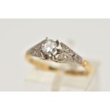 A SINGLE STONE DIAMOND RING, a round brilliant cut diamond prong set in white metal, leading onto