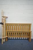 A SOLID LIGHT OAK 5FT BEDSTEAD, with side rails, slats and bolts