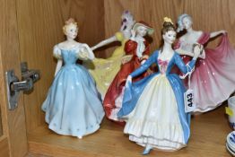 FIVE ROYAL DOULTON FIGURINES, comprising Enchantment HN2178, Leading Lady HN2269 (hairline from