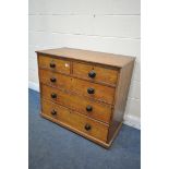 AN EARLY 20TH CENTURY OAK CHEST OF TWO SHORT OVER THREE LONG GRADUATED DRAWERS, with turned ebonised