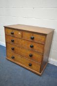 AN EARLY 20TH CENTURY OAK CHEST OF TWO SHORT OVER THREE LONG GRADUATED DRAWERS, with turned ebonised