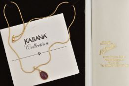 A 'KABANA' NECKLACE, red spiney tear drop cabochon flush set in yellow metal, accented with a