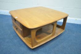 AN ERCOL ELM MODEL 735 PANDORA'S BOX ROLLING COFFEE TABLE, with an arrangement of drawer and
