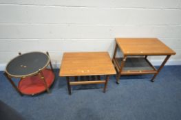 A MID-CENTURY TORBEN ORSKOV & CO TEAK CIRCULAR TWO TIER FOLDING SIDE TABLE, with two coloured trays,