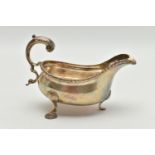 AN EDWARD VIII SILVER SAUCE BOAT, gadrooned rim, three feet, acanthus handle, hallmarked 'Goldsmiths