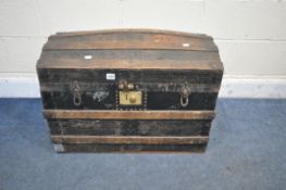 A VINTAGE WOOD AND METAL BANDED DOME TOP TRUNK, width 73cm x depth 43cm x height 51cm (condition -