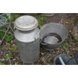 A GALVANIZED METAL OVAL BATH, with twin handles, length 76cm x depth 49cm x height 28cm, and an