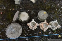 A SELECTION OF GARDEN ORNAMENT BASES, to include three terracotta bases, five circular bases, four