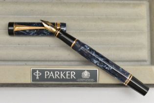 A 'PARKER' FOUNTAIN PEN, blue marble with gold tone detail, nib signed 'Parker', stamped 18k,
