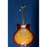 A GOULD ELECTRIC GUITAR, an ES335 copy, with sunburst finish, edge and binding, gold plated