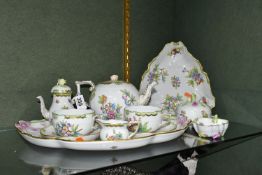 A HEREND PORCELAIN QUEEN VICTORIA PATTERN CABARET SET WITH THREE ADDITIONAL ITEMS IN THE SAME