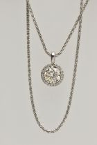 A WHITE METAL DIAMOND PENDANT NECKLACE, the pendant four claw set with a round brilliant cut