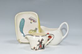 THREE PIECES OF MIDWINTER POTTERY, comprising a Jessie Tait 'Toadstools' pattern cream jug on the