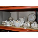 A SPODE 'FLEUR DE LYS GOLD' PATTERN DINNER SET, comprising a large oval meat plate, oval platter,