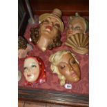 FIVE CHALKWARE FEMALE WALL PLAQUES, comprising a 1930's style Italian plaque signed G.Leonardi 287