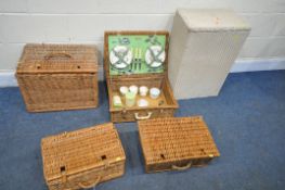 FOUR VARIOUS WICKER PICNIC BASKETS, and a Lloyd loom linen basket (condition report: one with