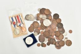 A SMALL BOX OF COINS, to include a pair of Faithful Service Police Medals to Trevor C Jones,