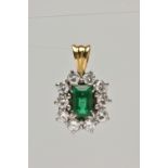 AN EMERALD AND DIAMOND CLUSTER PENDANT, centrally set with a rectangular cut emerald, measuring