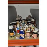 A GROUP OF 'WOOD' CHARACTER JUGS AND OTHER ORNAMENTS, comprising two Royal Doulton figurines 'Ping-