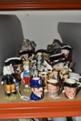 A GROUP OF 'WOOD' CHARACTER JUGS AND OTHER ORNAMENTS, comprising two Royal Doulton figurines 'Ping-