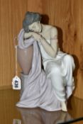 A LLADRO ‘LOST IN DREAMS’ FIGURINE, model no 6313, sculptor Antonio Ramos, issued 1996-2005,
