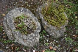 A PAIR OF COMPOSITE GARDEN PLANTERS, with scrolled and shell style design, length 53cm x width