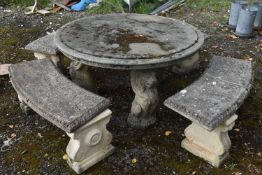 A RECONSTITUTED STONE FIVE PIECE GARDEN SUITE, comprising a circular table that rests on three