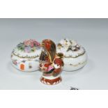 A ROYAL WORCESTER 'IMARI COCKEREL' CANDLE SNUFFER AND TWO ROYAL CROWN DERBY COVERED FLORAL BOXES,
