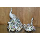 TWO PIECES OF 19TH CENTURY FLORAL ENCRUSTED DERBY PORCELAIN, comprising a Bloor Derby Roman oil lamp