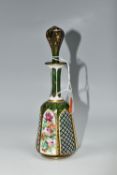 A 19TH CENTURY GREEN BOHEMIAN GLASS SCENT BOTTLE, of mallet form, with white overlay, alternating