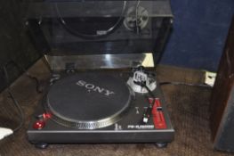 A SONY PS-DJ9000 TURNTABLE with pitch control, Stentor 500 cartridge, plexi glass lid (one hinge