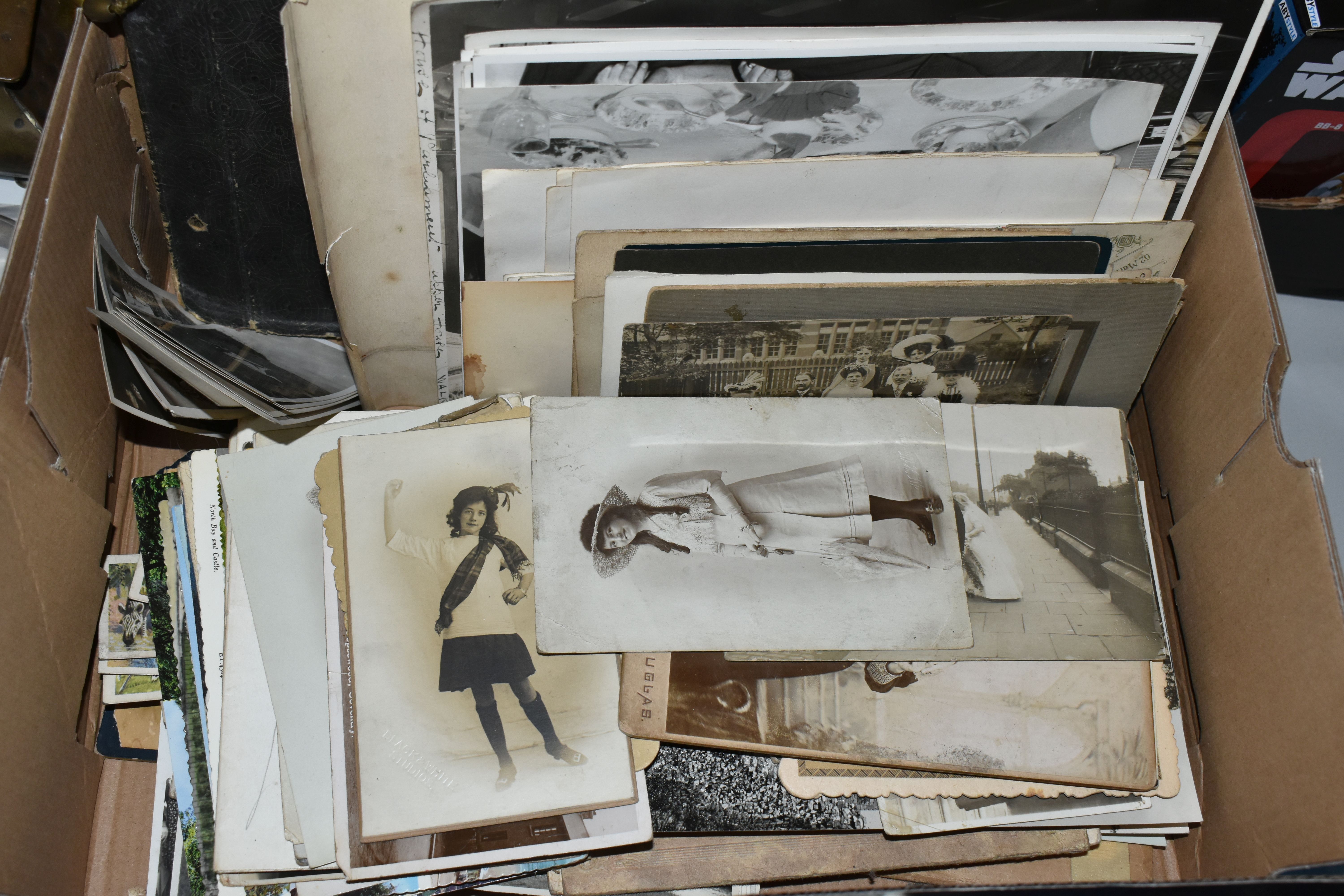 A BOX OF VINTAGE FAMILY PHOTOGRAPHS, largely first half of the twentieth century, with some