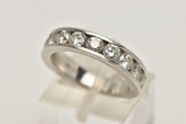 A WHITE METAL, DIAMOND HALF ETERNITY RING, channel set with ten round brilliant cut diamonds,