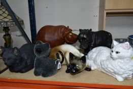 THREE LARGE CAT FIGURINES, comprising a ceramic Siamese cat, a black cat and long haired white