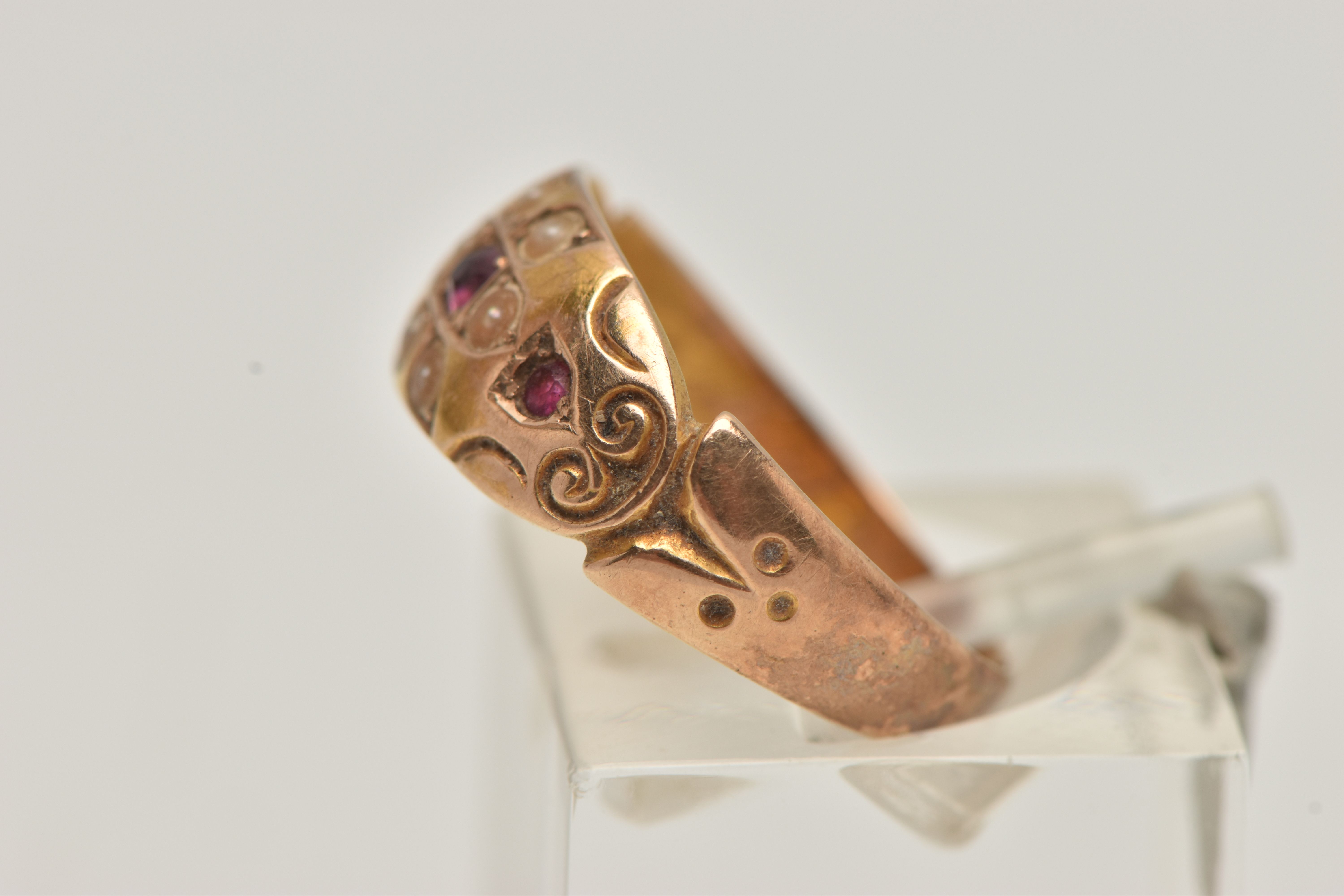 A LATE VICTORIAN 15CT GOLD RUBY AND PEARL RING, flower detail to the centre set with a central - Image 2 of 4