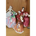 FIVE ROYAL DOULTON FIGURINES, comprising Autumn Breezes HN1911, Julia HN2705, Buttercup HN2399,