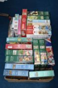 TWO BOXES OF JIGSAW PUZZLES comprising twenty 1000 piece puzzles, manufacturers include W H Smith,