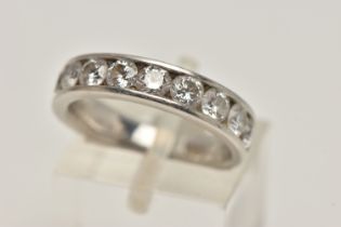 A PLATINUM DIAMOND HALF ETERNITY RING, channel set with ten round brilliant cut diamonds,