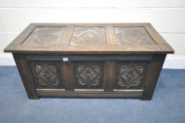 A GEORGIAN OAK PANELLED COFFER, width 106cm x depth 49cm x height (condition report: aged wear and