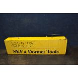A 'SKF AND DORMER TOOLS' SHOP ADVERTISING SIGN with illumination to inside (no tube or plug so