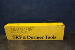 A 'SKF AND DORMER TOOLS' SHOP ADVERTISING SIGN with illumination to inside (no tube or plug so