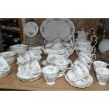 A SEVENTY FIVE PIECE ROYAL ALBERT 'HAWORTH' DINNER SERVICE, comprising two tureens, a meat plate,