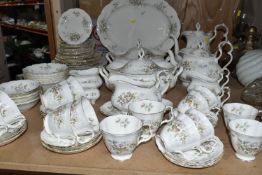 A SEVENTY FIVE PIECE ROYAL ALBERT 'HAWORTH' DINNER SERVICE, comprising two tureens, a meat plate,