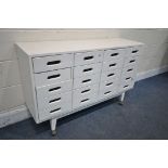 A HAND PAINTED BEECH SIDEBOARD/CHEST OF TWENTY DRAWERS, on casters, width 120cm x depth 36cm x