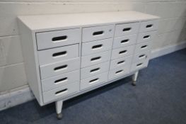 A HAND PAINTED BEECH SIDEBOARD/CHEST OF TWENTY DRAWERS, on casters, width 120cm x depth 36cm x